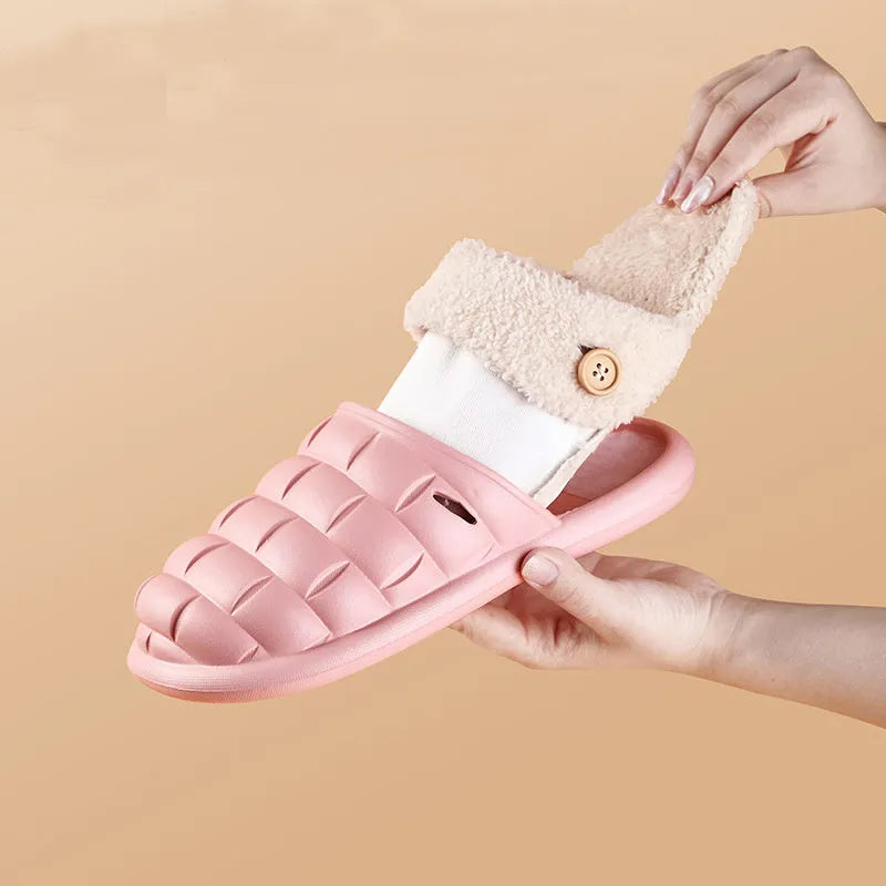 Plaid patterned EVA detachable slippers with plush lining, shown in pink, on a plain background.