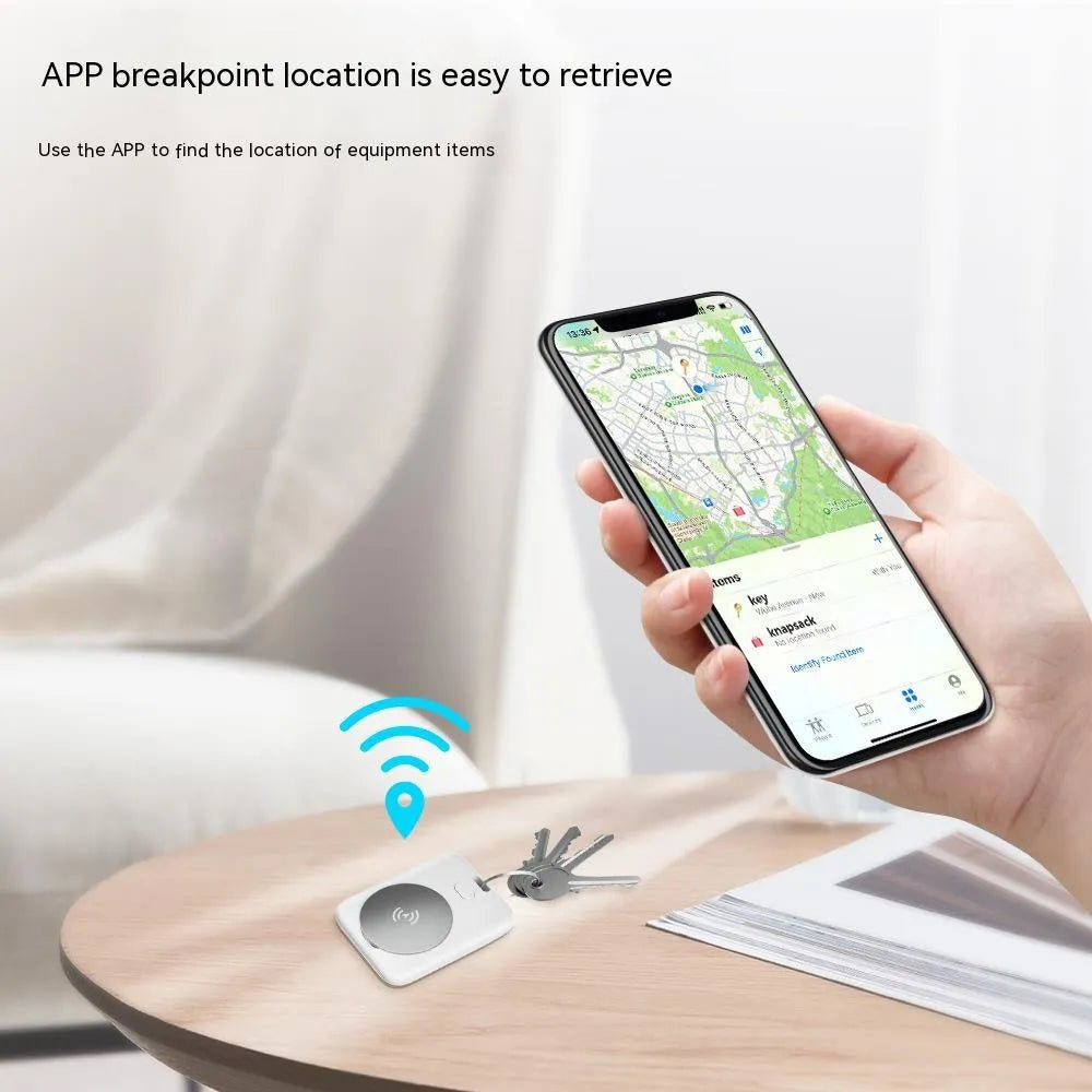 White ABS plastic pet tracking device with portable wearing attachment for Apple devices