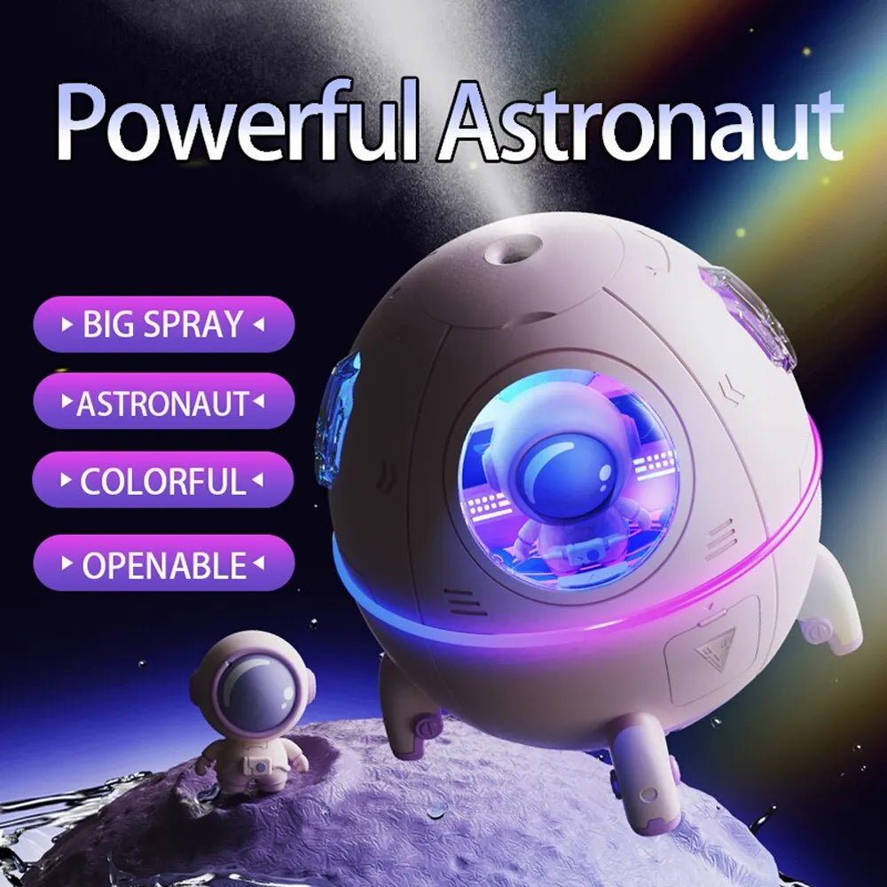 Purple astronaut-shaped USB desktop humidifier with colourful LED lights showing 220ml water capacity