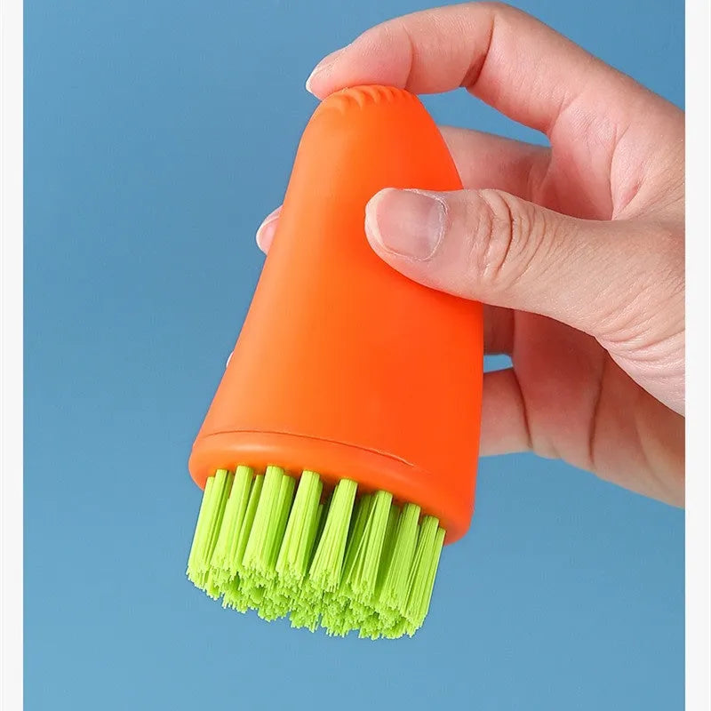 Orange and white carrot-shaped nylon vegetable cleaning brush for scrubbing potatoes