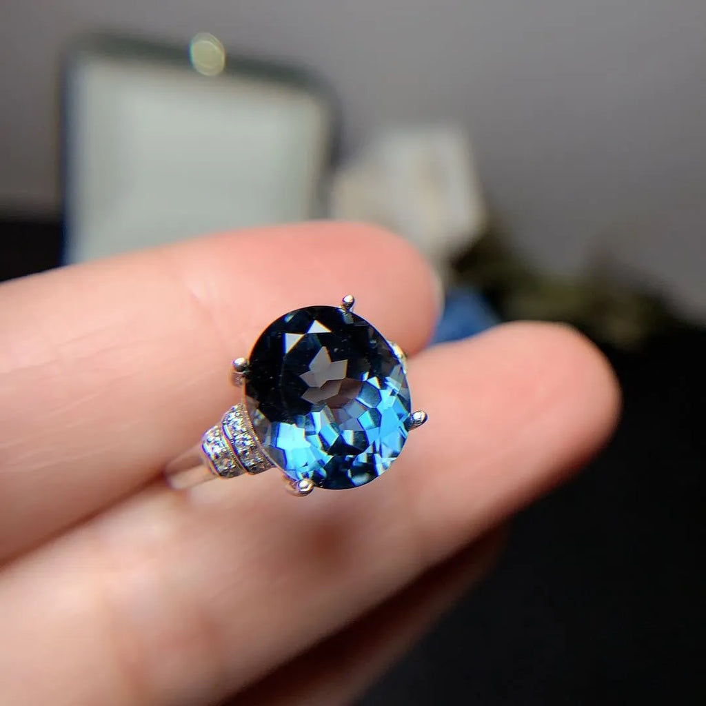 London Blue Topaz ring in deep dark blue crown cut on 925 silver with white gold plating adjustable opening