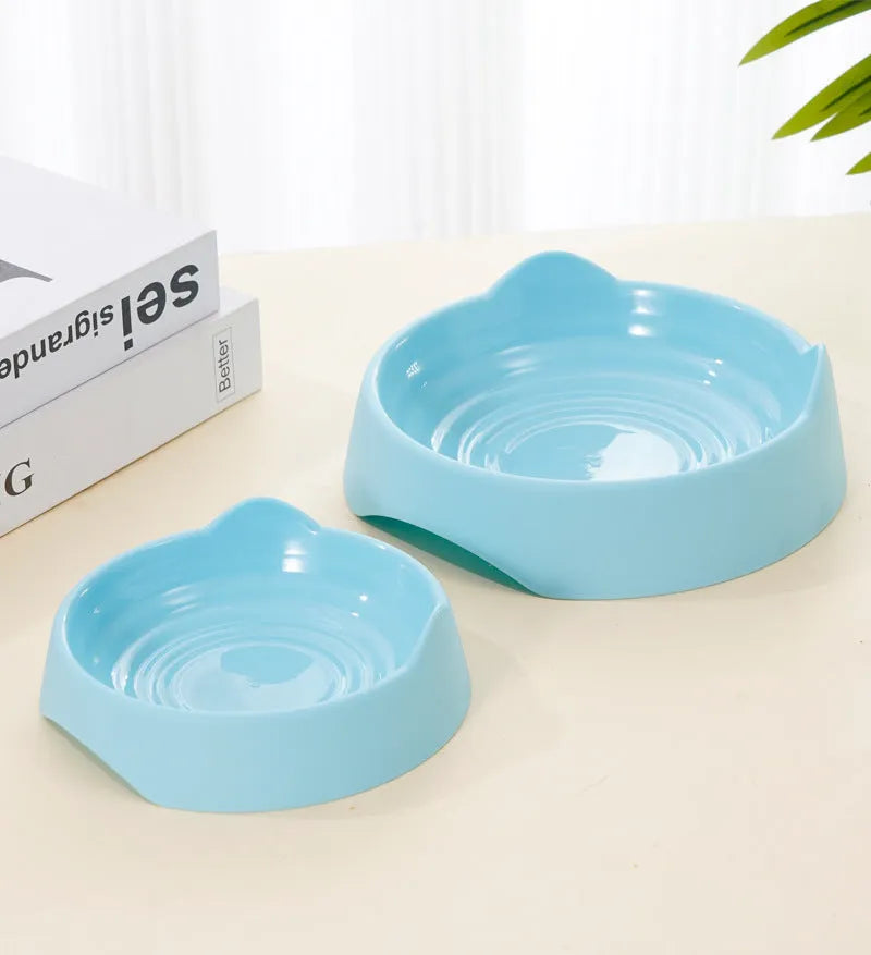 Blue ceramic dog slow feeder bowl with four puzzle maze cups for slowing fast eaters