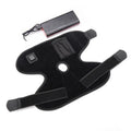 Black ankle heating wrap with red light therapy and USB cable on flat surface