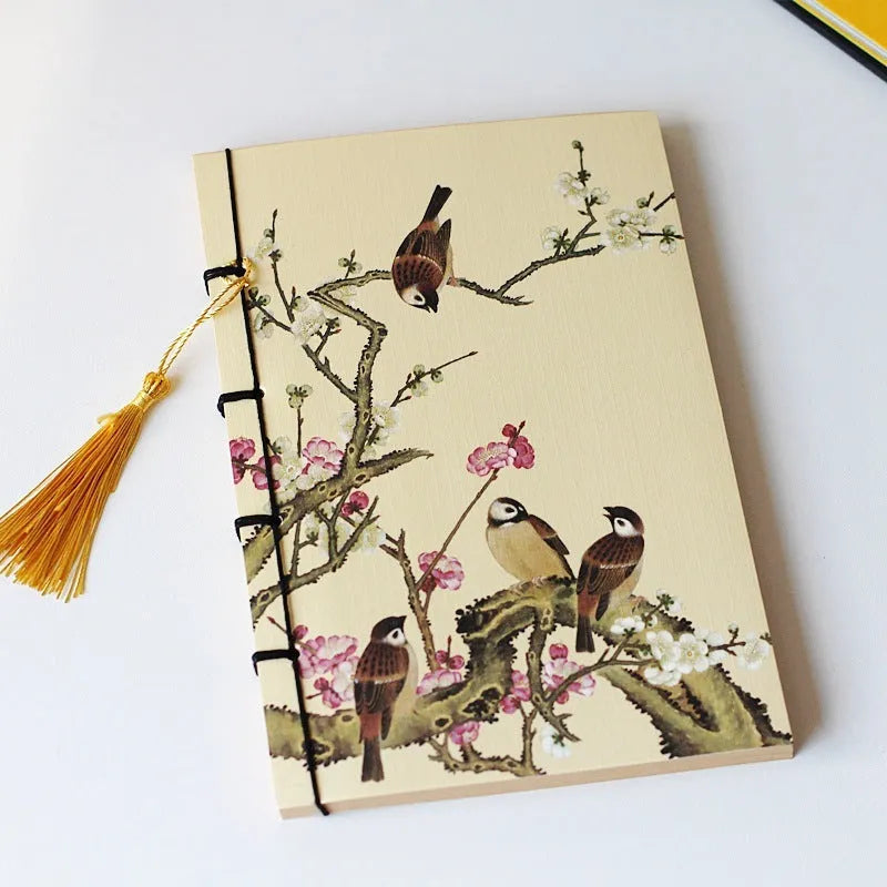 A5 antique thread-bound notebook with embossed cover and decorative tassels