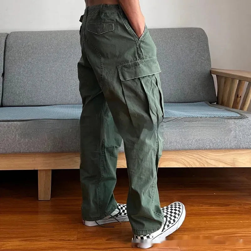 Men's loose cotton paratrooper trousers in Army Green with mid rise zipper fly
