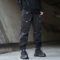 Men's black polyester overalls with bundled feet and cropped leg