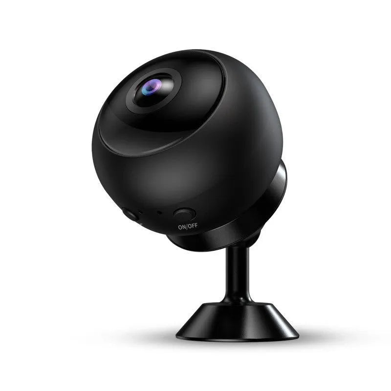 White indoor 1080p Wi-Fi security camera with USB cable on a table.