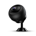 White indoor 1080p Wi-Fi security camera with USB cable on a table.