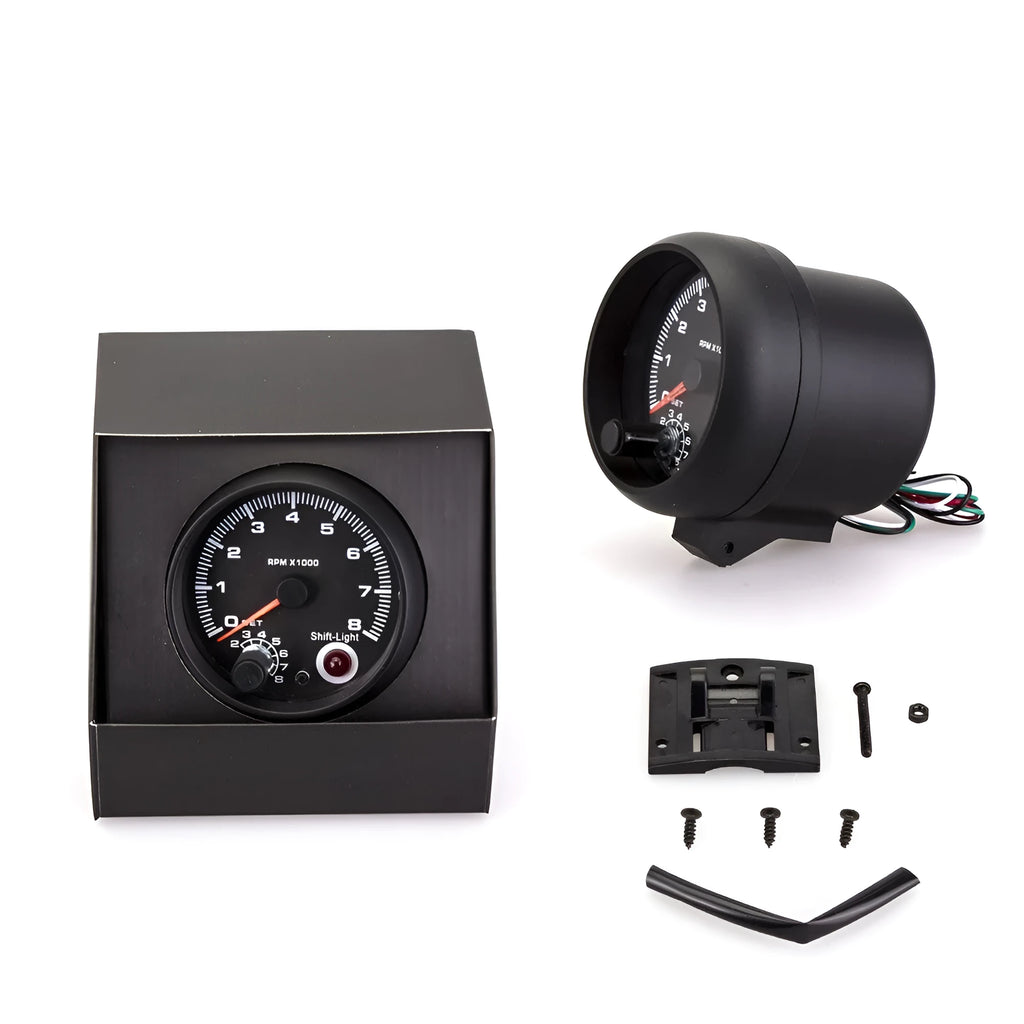 Blue light pointer automotive tachometer showing 0-8000 RPM range