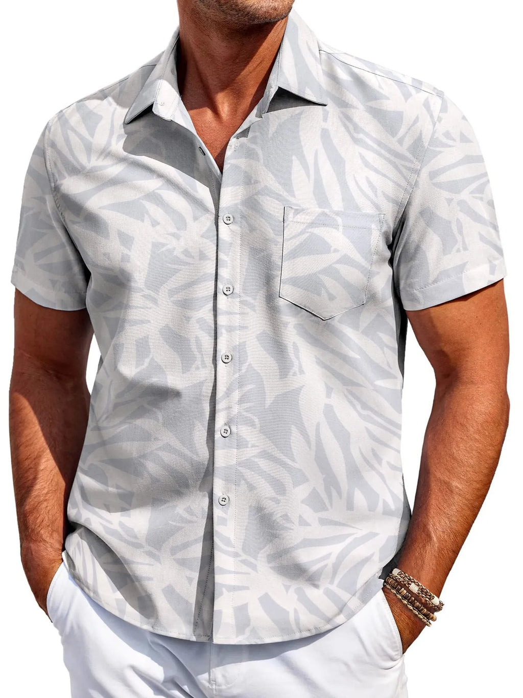 Man wearing a slim fit short sleeve Hawaiian shirt in a solid colour