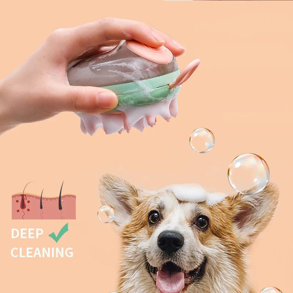 Blue 2-in-1 pet grooming brush with soft silicone bristles and shampoo dispenser on a light background