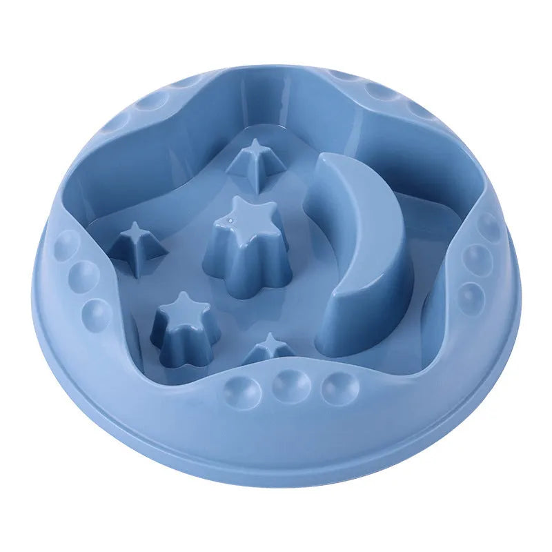 Large blue slow feeder dog bowl with raised moon and star wing patterns and a non-slip rubber base.
