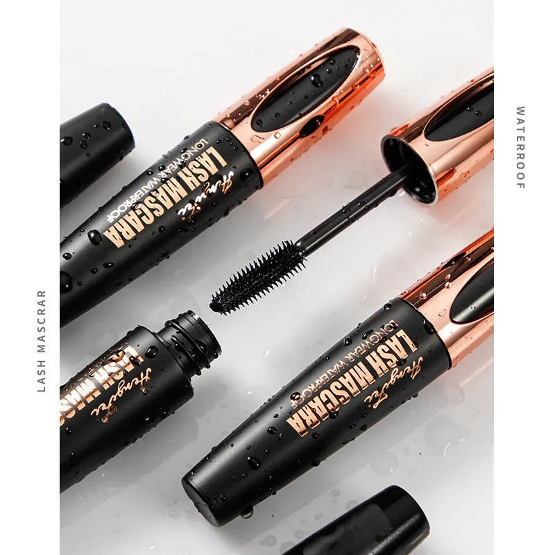Black waterproof mascara with applicator creating thick long curled lashes