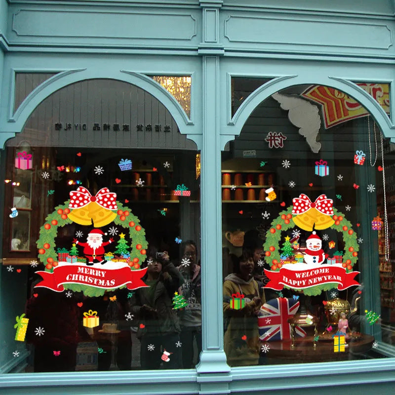 Two large colourful Christmas wall stickers with cartoon patterns measuring 60x45cm each for electrostatic window application