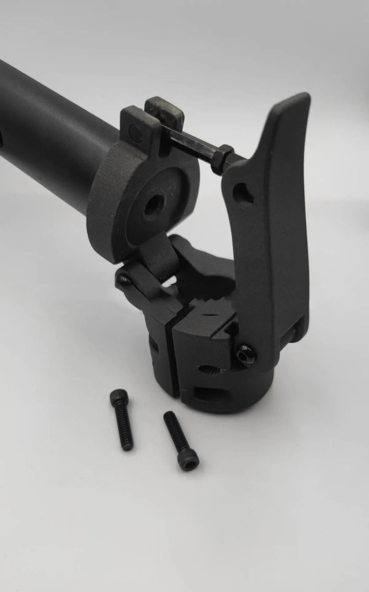 Black metal folding upright pole accessory for a Nanbo No. 9 electric scooter.