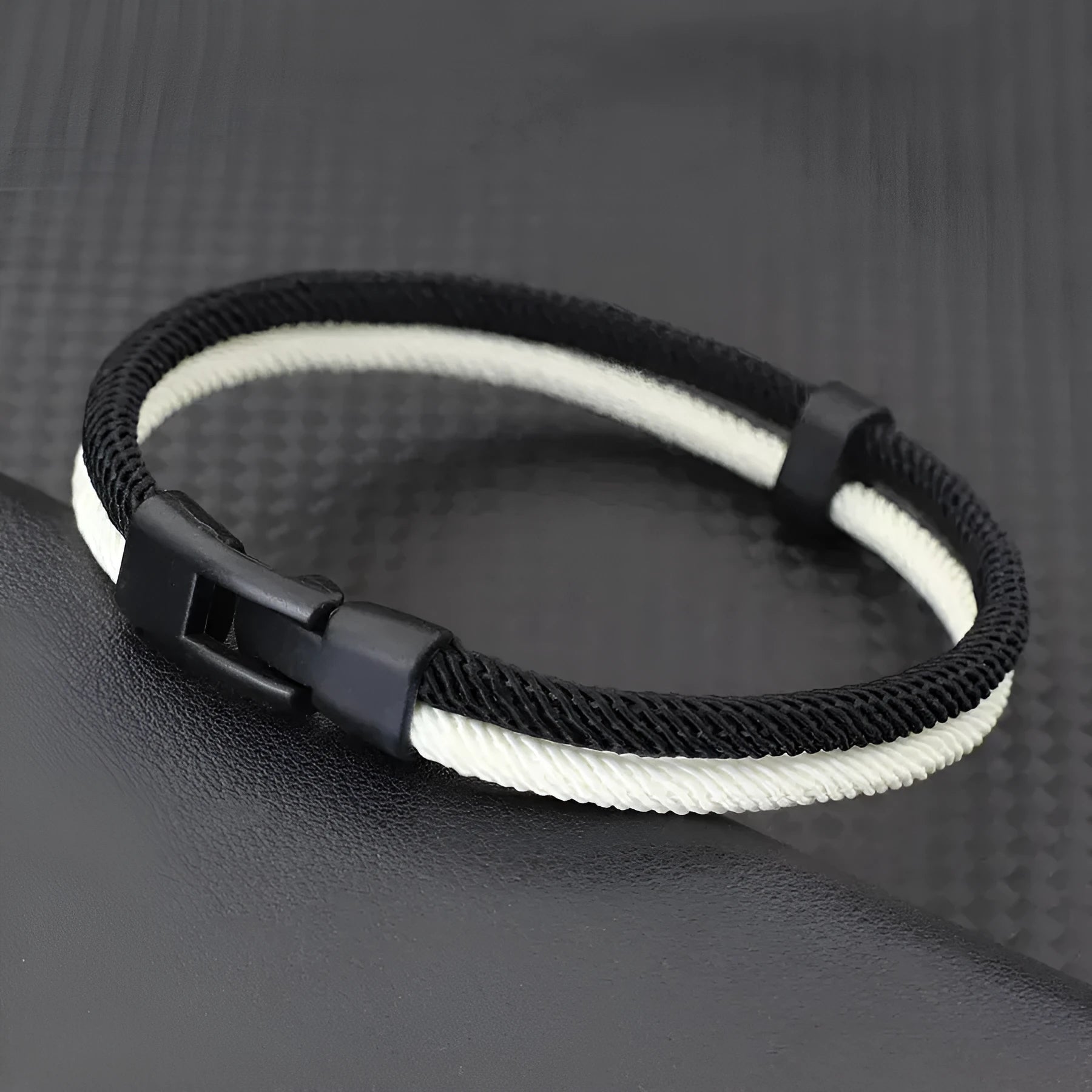 Black and white woven Milan rope alloy hand strap showing three size options