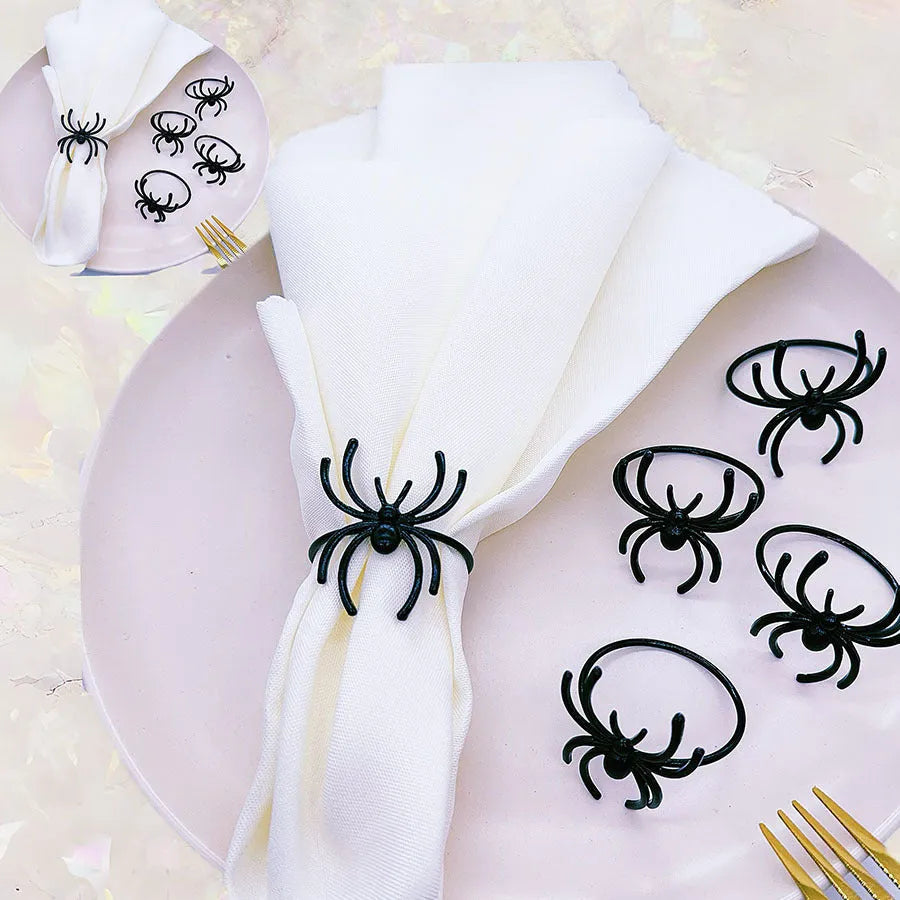 Six black spider-shaped alloy metal napkin rings for Halloween table decoration